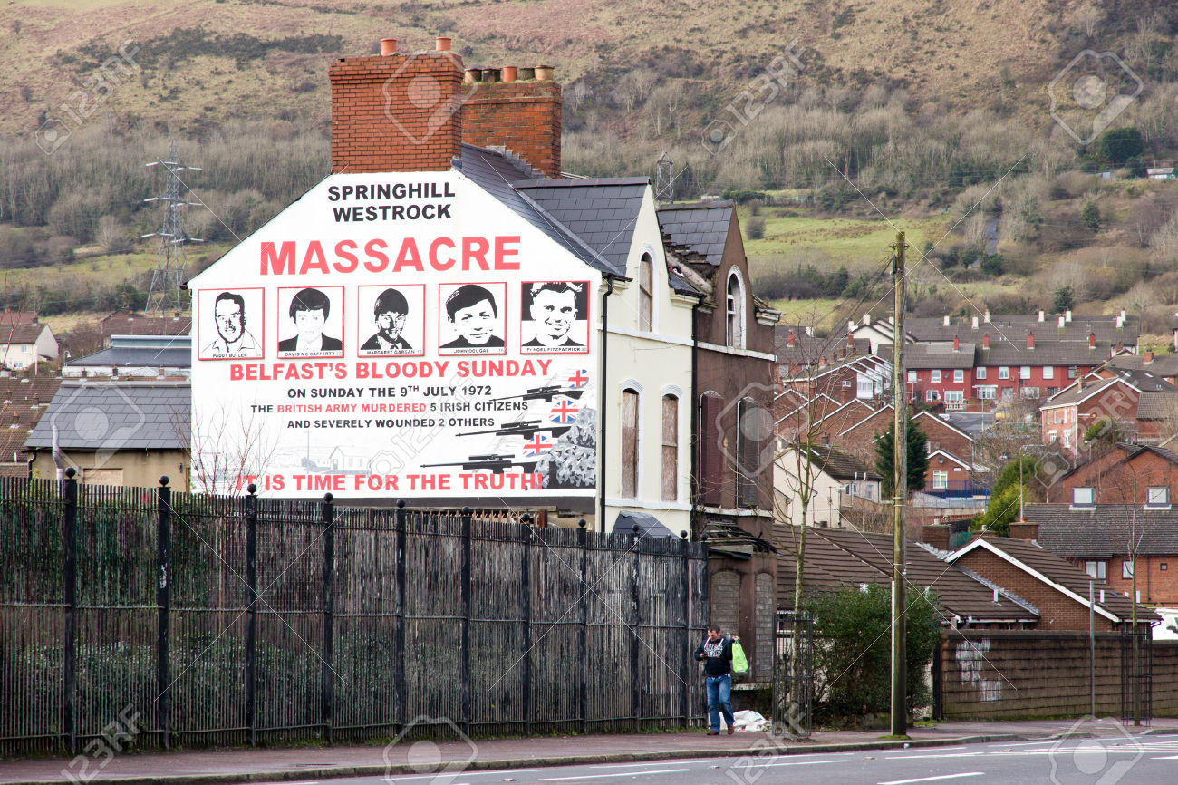 BELFAST, NORTHERN IRELAND - FEB 9, 2014: Mural of Springhill westrock massacre on Springfield Road in Belfast, Northern Ireland. Springfield Road was the site of much activity during the Troubles.
